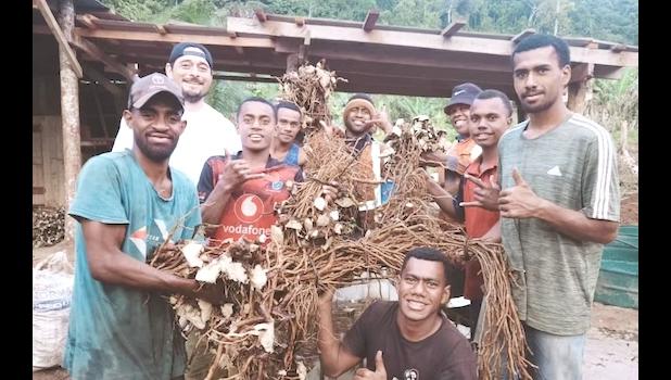 Saimon Lomaloma and others with kava