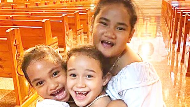 3 laughing and joyful young girls