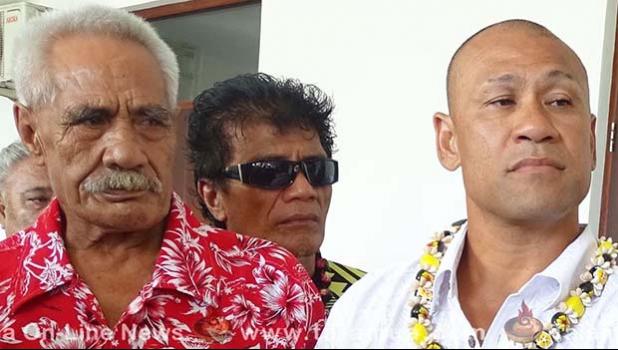 Paulo Malele or King Faipopo (in white shirt) who is charged for making false statements against the Prime Minister, with some of his supporters outside court