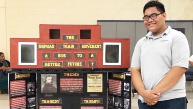 Koneferinisi Purcell of Manumalo Academy with his project "The Orphan Train Movement: A Ride to a Better Future?" 