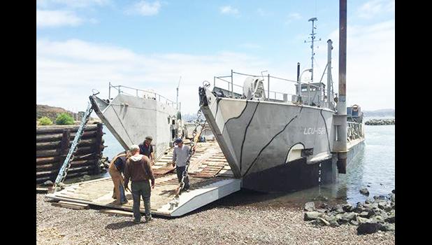 A landing craft being used for commercial purposes