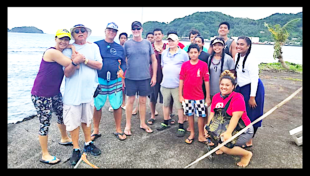 Laser sailors celebrating with families and supporters 