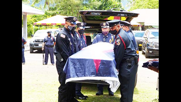 American Samoa flag draped casket of the late former Sen. Tulifua Tini Lam Yuen with police escorte