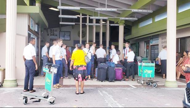 LDS church missionaries at Majuro airport