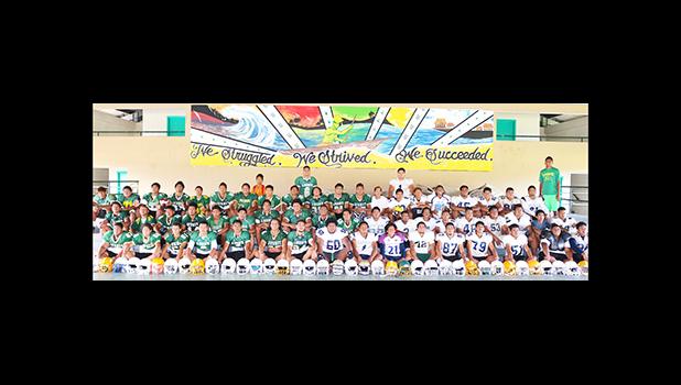 Leone High School, "Home of the Lions" – Football Team, both Varsity and Junior Varsity (JV) combined in this team photo. Led by Head Coach Okland Salave'a, they will open this year’s football season against the Vikings this Saturday morning at the Veterans Memorial Stadium. [photo: TG]