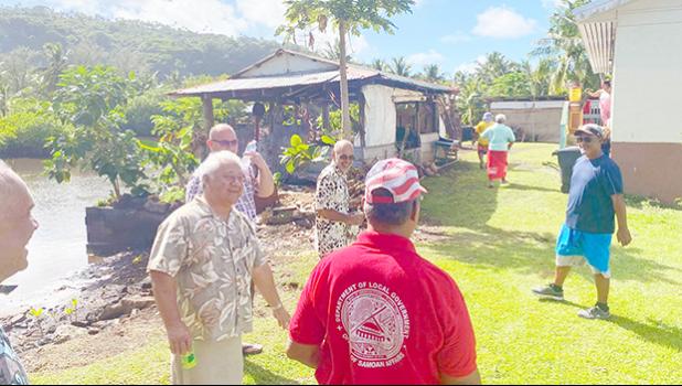 Leone chiefs inspecting homes in the village