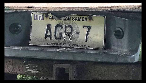 The license plate of the Department of Agriculture vehicle 