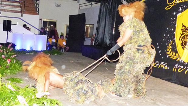 Two students dressed as lions
