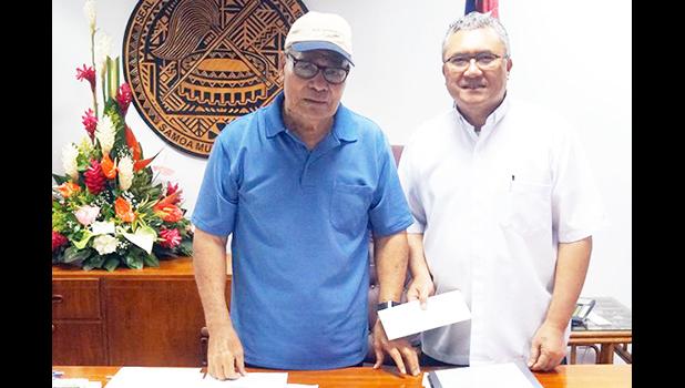 Gov. Lolo Matalasi Moliga in a photo from Tuesday, July 23, 2019 with Monsignor Viane Etuale