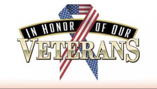 Sign reading — In honor of our veterans