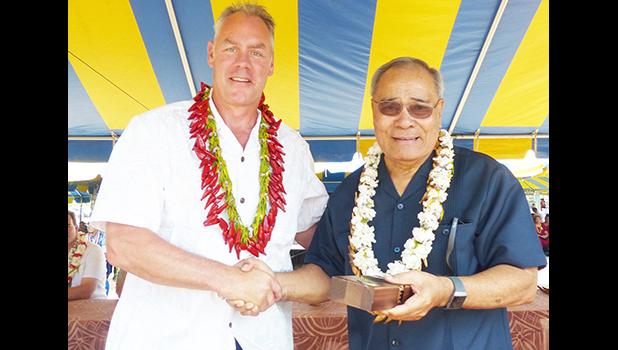 Interior Secretary Fofoga-o-Samoa Ryan Zinke presents Governor Lolo Matalasi Moliga with a special medal