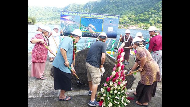 Gov. Lolo Matalasi Moliga (far right), accompanied by Western Pacific Regional Fishery Management Council chairman Taotasi Archie Soliai and others