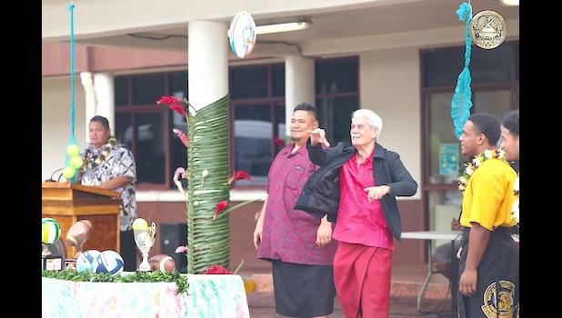 Acting Governor Pulumataala Ae Ae Jr. throws first pass