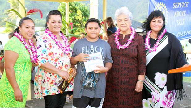 Eleven-year-old Malakai Seva’aetasi with his grandmother, the First Lady and  One Global Family co-founder and her daughter