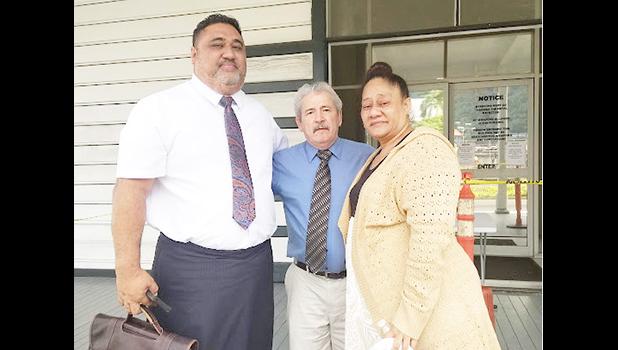 Tumuatasi Lefatia with her attorneys