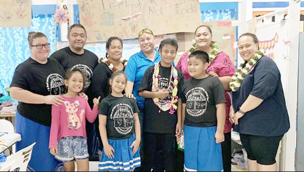 The deaf/ hard of hearing students at Manulele Tausala Elementary, pictured with instructors/ deaf educators — Dana Love-Ili and Hofeni Fitiao — and parents.