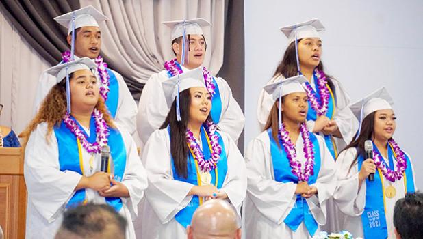 In this photo, seven of the eight graduates of the Manumalo Baptist Academy Class of 2021 are seen singing one of the their special songs, during their Commencement ceremony on May 28th. Seven of the eight Manumalo graduates
