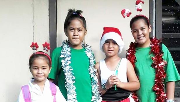 Matafao Elementary School students in their Christmas finery