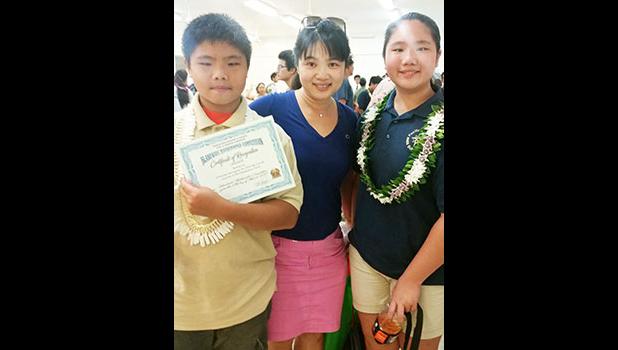 Pacific Horizons took home third place overall for the Territorial Math Competition. Michelle Lo came in third place for the 9th grade division while her brother Kevin placed second for the Grade 8 Division. [photo: Blue Chen-Fruean]