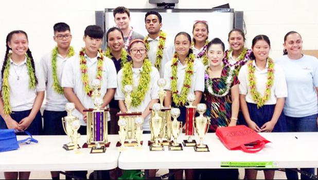 Manumalo Academy was represented well during the Territorial Math Competition held last week. Their students took first place for the Grade 8, 9, 10 and 11 Division, and second place in the 12th grade division. The Flames took second place overall.  [photo: Blue Chen-Fruean]