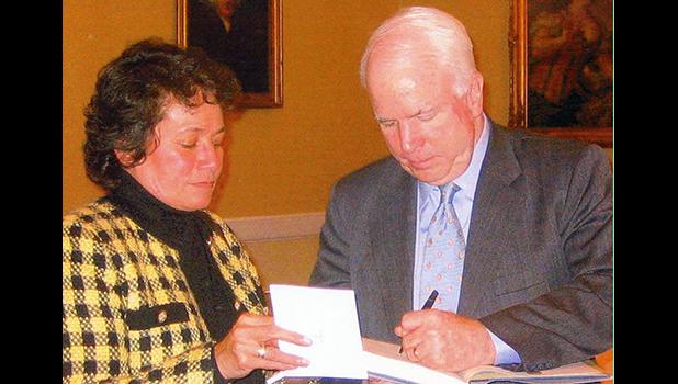 Aumua Amata with Senator John McCain. 