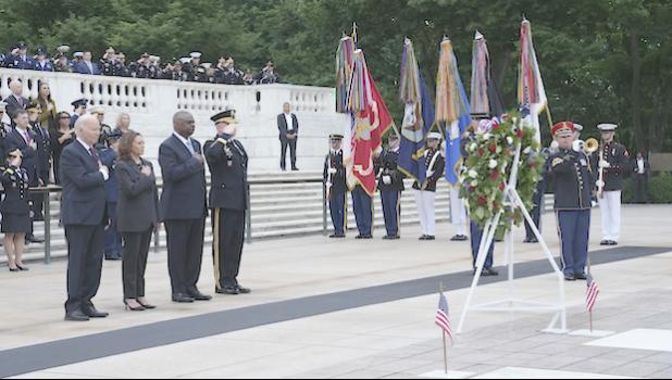 President Joe Biden, left, joined by, from left, Vice President Kamala Harris, Defense Secretary Lloyd Austin and Army Major Gen. Trevor Bradenkamp