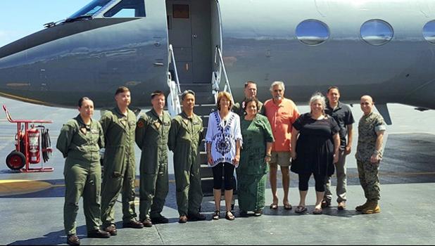 Aumua Amata with Chairman Lisa Murkowski of Alaska, and the military flight crew