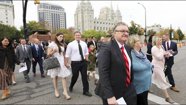 People arrive for the twice-annual conference of The Church of Jesus Christ of Latter-day Saints Saturday, Oct. 6, 2018, in Salt Lake City. (AP Photo/Rick Bowmer) People arrive for the twice-annual conference of The Church of Jesus Christ of Latter-day Saints Saturday, Oct. 6, 2018, in Salt Lake City