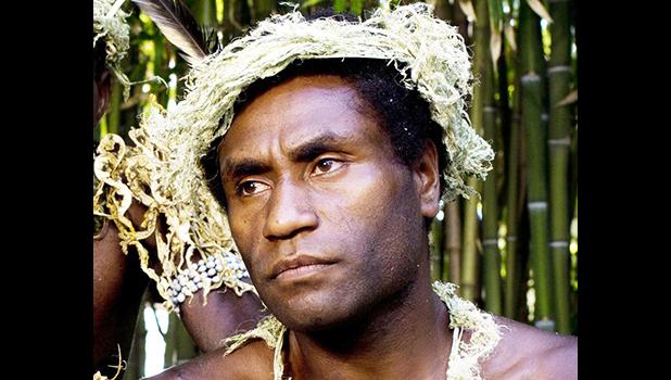 This Sept. 9, 2015, file photo shows Mungau Dain in Venice, Italy. Dain had never considered acting before he starred in the Oscar-nominated film “Tanna.” He got the role because his elders decided he was the best-looking guy in their traditional village on the Pacific nation of Vanuatu. Dain died Saturday, Jan. 5, 2019, in the capital Port Vila, after contracting a leg infection that wasn’t quickly treated. He was in his mid-20s. (AP Photo/Domenico Stinellis, File) This Sept. 9, 2015, file photo shows Mungau Dain in Venice, Italy