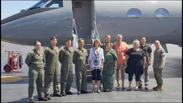 Senator Murkowski and Aumua Amata with flight crew