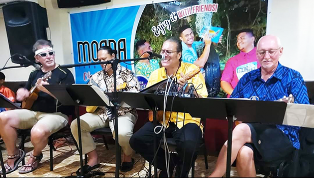 The Coconut Beatles entertaining at Paradise Pizza Bar & Grill, Nuuuli