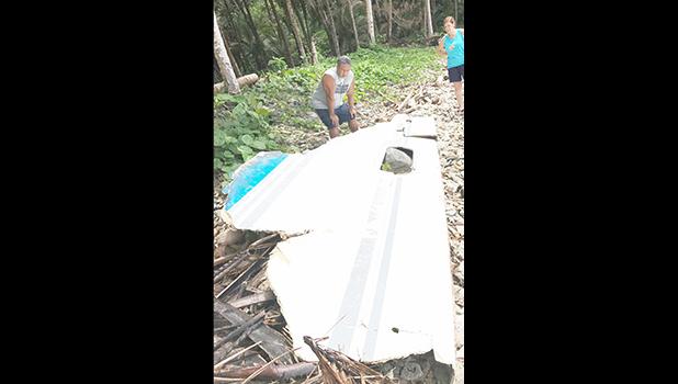 The Gurr family discovered, what one family member says appears to be a piece of a fishing boat, on the beach fronting their home at Maloatoa around Sunday afternoon (Mar. 26).  [Courtesy photo]