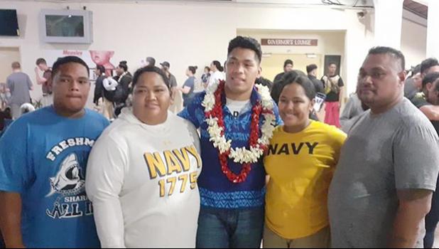 John Leulu with his parents and siblings
