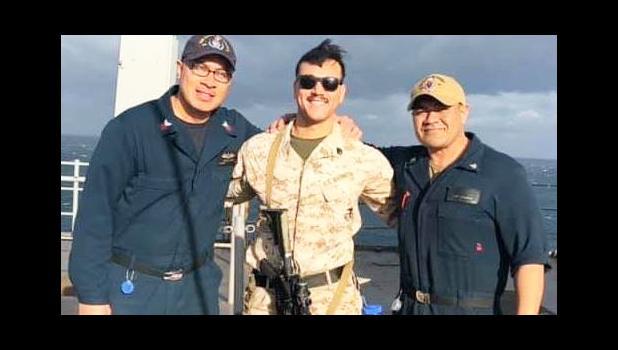(l-r) ET1 (SW) Electronics Technician First Class Fiafia D. Sunia, SSgt Argiroudis Aristides, and MM3 (Machinists Mate Third Class) James Amuimuia