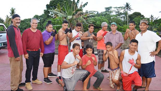 Seen here are local boxing officials with some of the new boxers, who may just fulfill their dreams of becoming future champions for American Samoa. See story for full details.  [photo: AF]