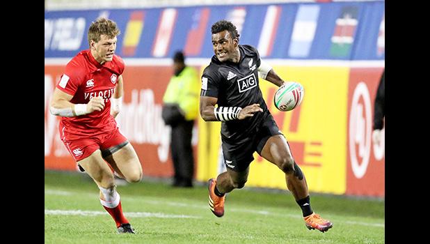 New Zealand’s Akuila Rokolisoa scores against Canada