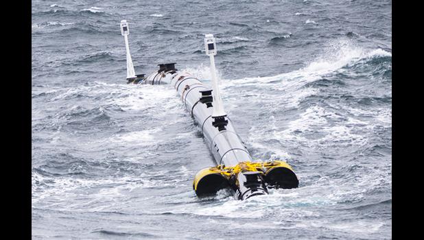 Photo of Ocean Cleaning Machine on the water.