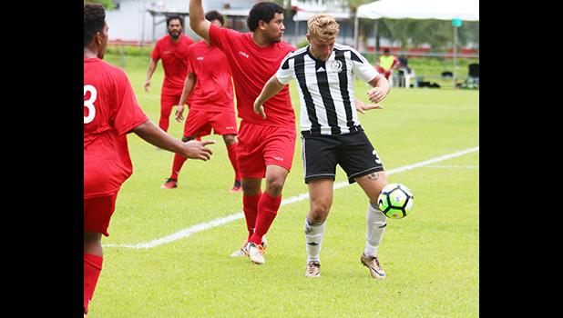 Sean Latimer for Tupapa Maraerenga FC just seconds away from netting his first goal of the match against Veitongo FC during the first half of their OFC Champions League Qualifiers match up this past Tuesday. Latimer and Bonsu-Maro both scored hat-tricks in their 9-2 win over the Tongans. All tourney games are played at the Pago Soccer Field. [photo: TG]