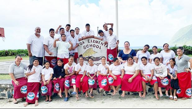 ASDHS personnel and students and staff at Olosega Elementary school