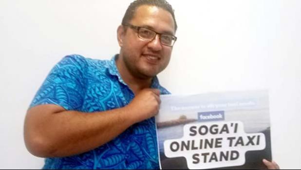  Dr. Kapuana Ainuu holding Soga'i Online Taxi Stand sign