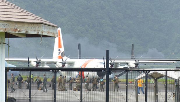 People deplaning uscg plane