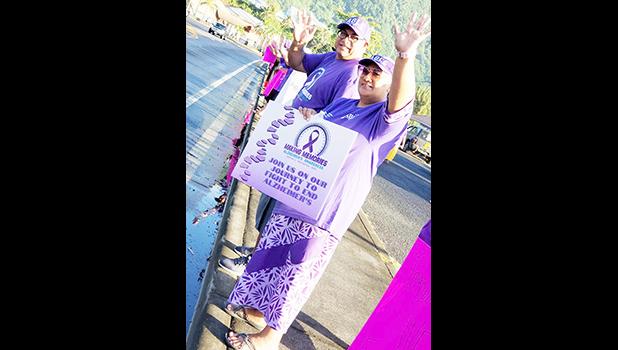 Some of the local residents, all dressed in purple at Alzheimer's month wave