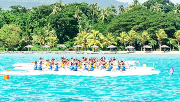 An action shot of va'a teams lining up at the Pacific Games event