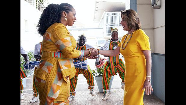 U.S. House Speaker Rep. Nancy Pelosi, D-Calif., shakes hands with the Hon. Sarah Adwoa Sarfo outside Ghana's Parliament 