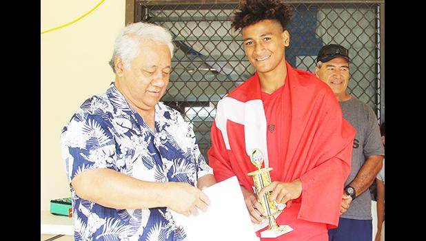Petu Pouli of Vaiala Tongan’s Boys 13-15 team receives his MVP award