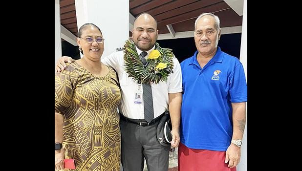 Talisau Lincoln Moliga with his parents
