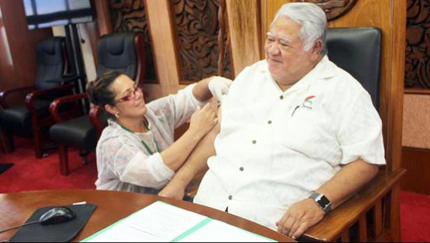  Samoa's Prime Minister Tuilaepa Sailele Malielegaoi receives his measles vaccination.