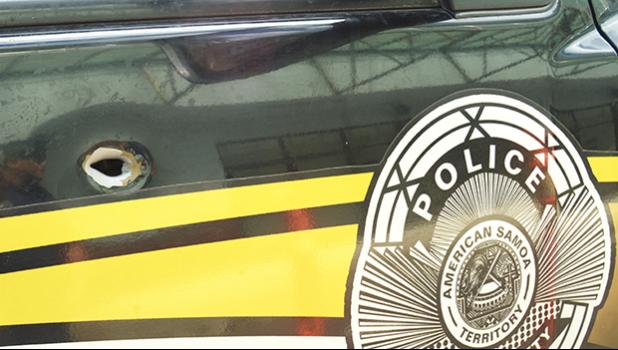 A bullet hole is seen on the right door of a DPS unit following an incident that happened on Dec. 14 behind the ASTCA compound at Tafuna, when a person/persons fired twice at the police unit. Luckily police officers were not inside the vehicle or close to it when the shots happened. [SN file photo]