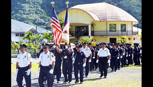 DPS police officers during a parade yesterday morning at Malaeoletalu in Fagatogo, following an inspection by Lt. Governor Lemanu Palepoi Sialega Mauga and DPS Commissioner Le'i Sonny Thompson, as part of Police Week 2018 celebrations. Today and tomorrow, informational booths will be set up at the Fagatogo Malae and Family Day is set for Friday at Suigaula ole Atavasa Beach Park in Fagaalu. Celebrations conclude this Saturday with the formal Police Ball set to be held at the Governor H. Rex Lee Auditorium. 