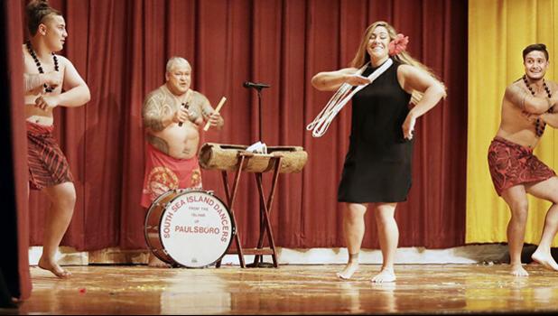 (L-R) Tino Savaiinaea, Chief Sikopu "Scope" Savaiinaea, Katie Savaiinaea-Elisaia and Niko Savaiinaea dance together